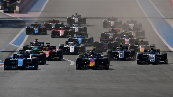 LE CASTELLET, FRANCE - JULY 24: Jack Doohan of Australia and Virtuosi Racing (3) and Ayumu Iwasa of Japan and DAMS (17) lead the field into turn one at the start during the Round 9:Le Castellet Feature race of the Formula 2 Championship at Circuit Paul Ricard on July 24, 2022 in Le Castellet, France. (Photo by Dan Mullan/Getty Images)
