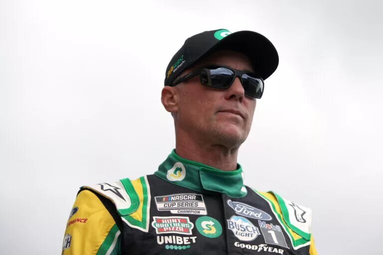 KANSAS CITY, KANSAS - OCTOBER 24: Kevin Harvick, driver of the #4 Subway Delivery Ford, walks onstage during pre-race ceremonies prior to the NASCAR Cup Series Hollywood Casino 400 at Kansas Speedway on October 24, 2021 in Kansas City, Kansas. (Photo by Sean Gardner/Getty Images)