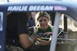 KNOXVILLE, IOWA - JUNE 17: Hailie Deegan, driver of the #1 Monster Energy Ford, works with her crew to prepare the car in between practice sessions during the NASCAR Camping World Truck Series Clean Harbors 150 Practice at Knoxville Raceway on June 17, 2022 in Knoxville, Iowa. (Photo by Kyle Rivas/Getty Images)