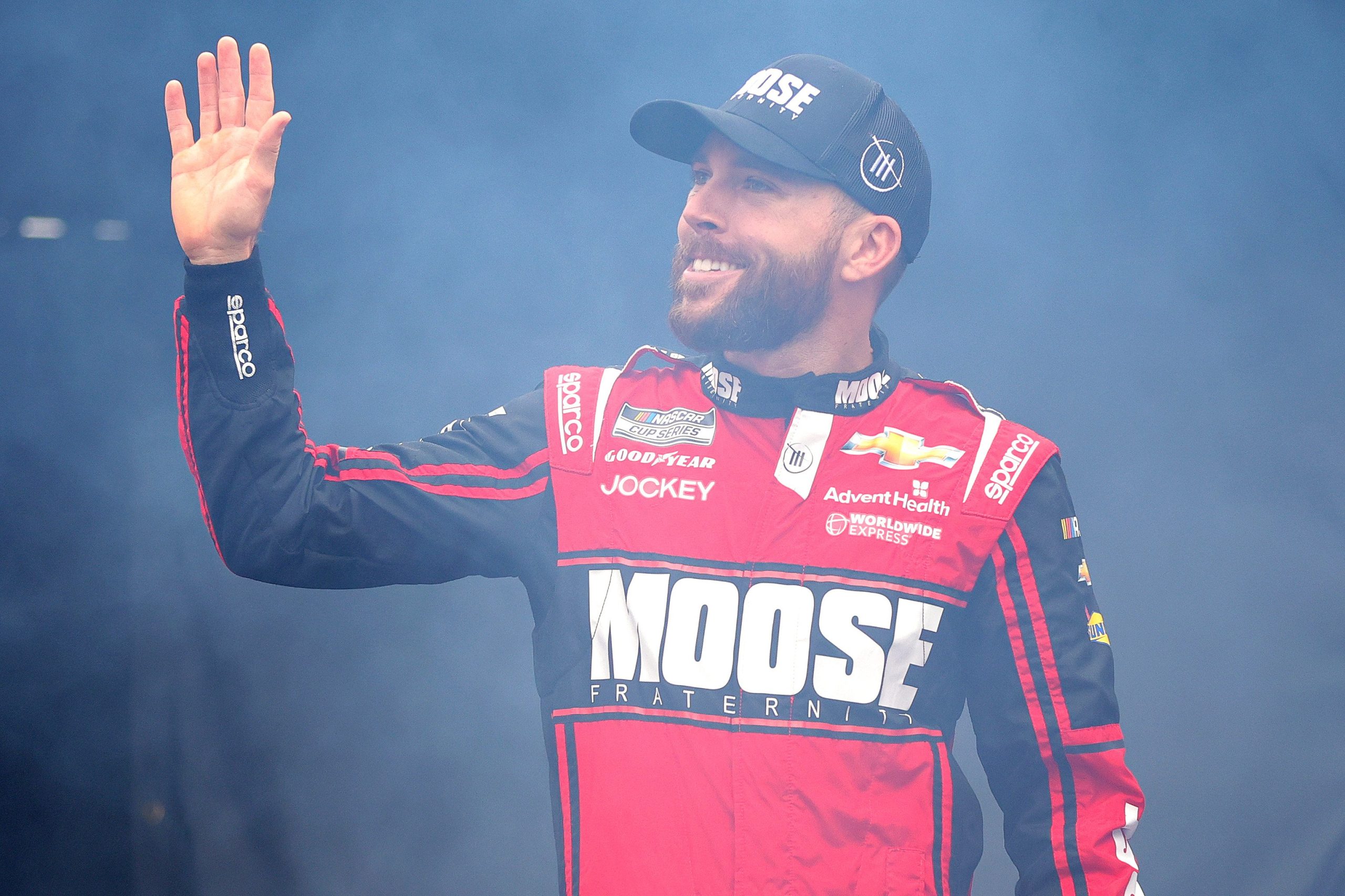 MARTINSVILLE, VIRGINIA - OCTOBER 30: Ross Chastain, driver of the #1 Moose Fraternity Chevrolet, waves to fans as he walks onstage during driver intros prior to the NASCAR Cup Series Xfinity 500 at Martinsville Speedway on October 30, 2022 in Martinsville, Virginia. (Photo by Stacy Revere/Getty Images)