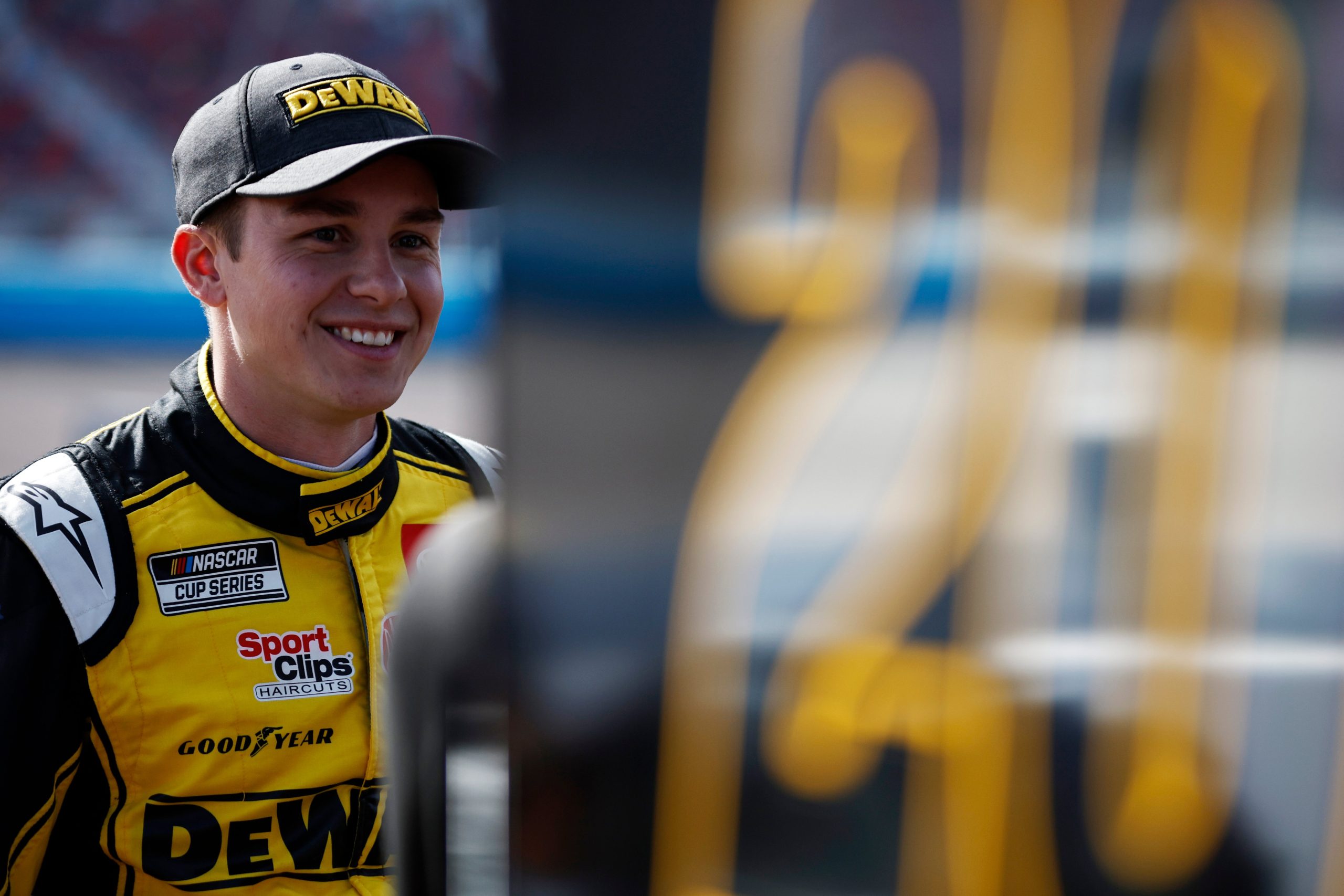 AVONDALE, ARIZONA - NOVEMBER 05: Christopher Bell, driver of the #20 DeWalt Toyota, waits on the grid during qualifying for the NASCAR Cup Series Championship at Phoenix Raceway on November 05, 2022 in Avondale, Arizona. (Photo by Sean Gardner/Getty Images)