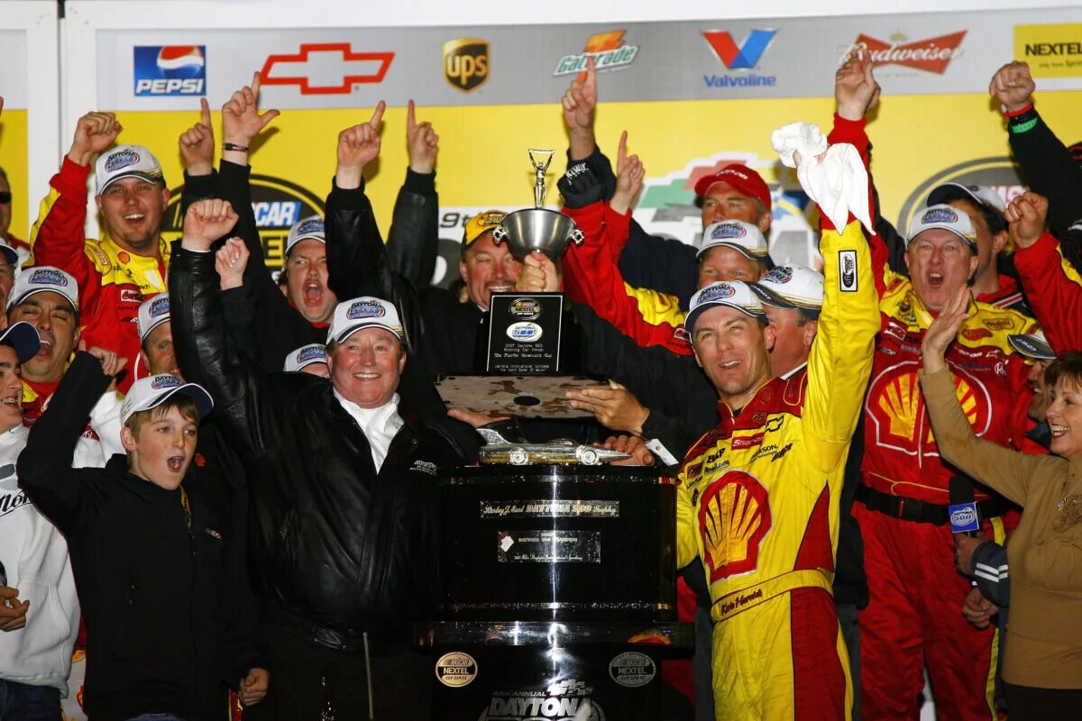 DAYTONA, FL - FEBRUARY 18: Kevin Harvick (R), driver of the #29 Shell/Pennzoil Chevrolet, and team owner Richard Childress, celebrate in victory lane with team members, after winning the NASCAR Nextel Cup Series Daytona 500 at Daytona International Speedway on February 18, 2007 in Daytona, Florida. (Photo by Rusty Jarrett/Getty Images for NASCAR)