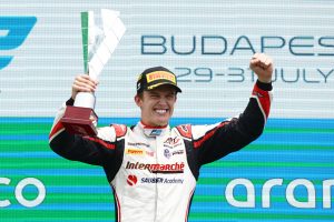BUDAPEST, HUNGARY - JULY 31: Race winner Theo Pourchaire of France and ART Grand Prix (10) celebrates on the podium during the Round 10:Budapest Feature race of the Formula 2 Championship at Hungaroring on July 31, 2022 in Budapest, Hungary. (Photo by Francois Nel/Getty Images)