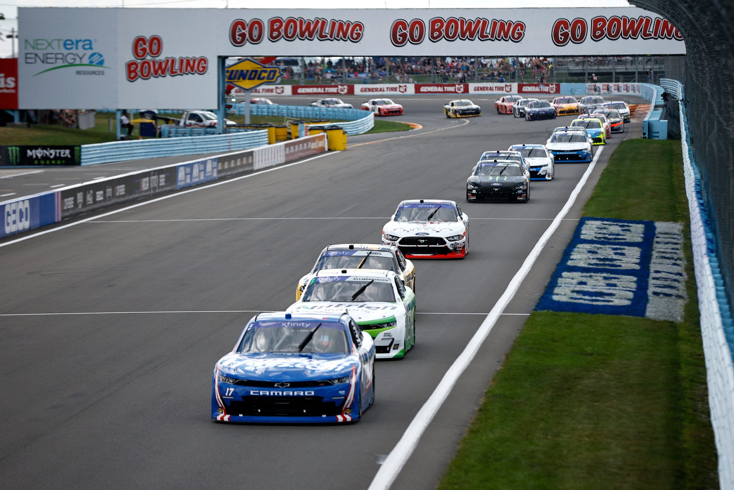 WATKINS GLEN, NEW YORK - AUGUST 20: William Byron, driver of the #17 HendrickCars.com Chevrolet, leads the field during the NASCAR Xfinity Series Sunoco Go Rewards 200 at The Glen at Watkins Glen International on August 20, 2022 in Watkins Glen, New York. (Photo by Sean Gardner/Getty Images)