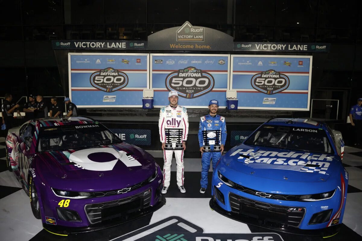 DAYTONA BEACH, FLORIDA - FEBRUARY 15: Pole Award winner, Alex Bowman, driver of the #48 Ally Chevrolet, (L) and Front Row winner, Kyle Larson, driver of the #5 HendrickCars.com Chevrolet, pose for photos after the the Busch Light Pole at Daytona International Speedway on February 15, 2023 in Daytona Beach, Florida. (Photo by Sean Gardner/Getty Images)