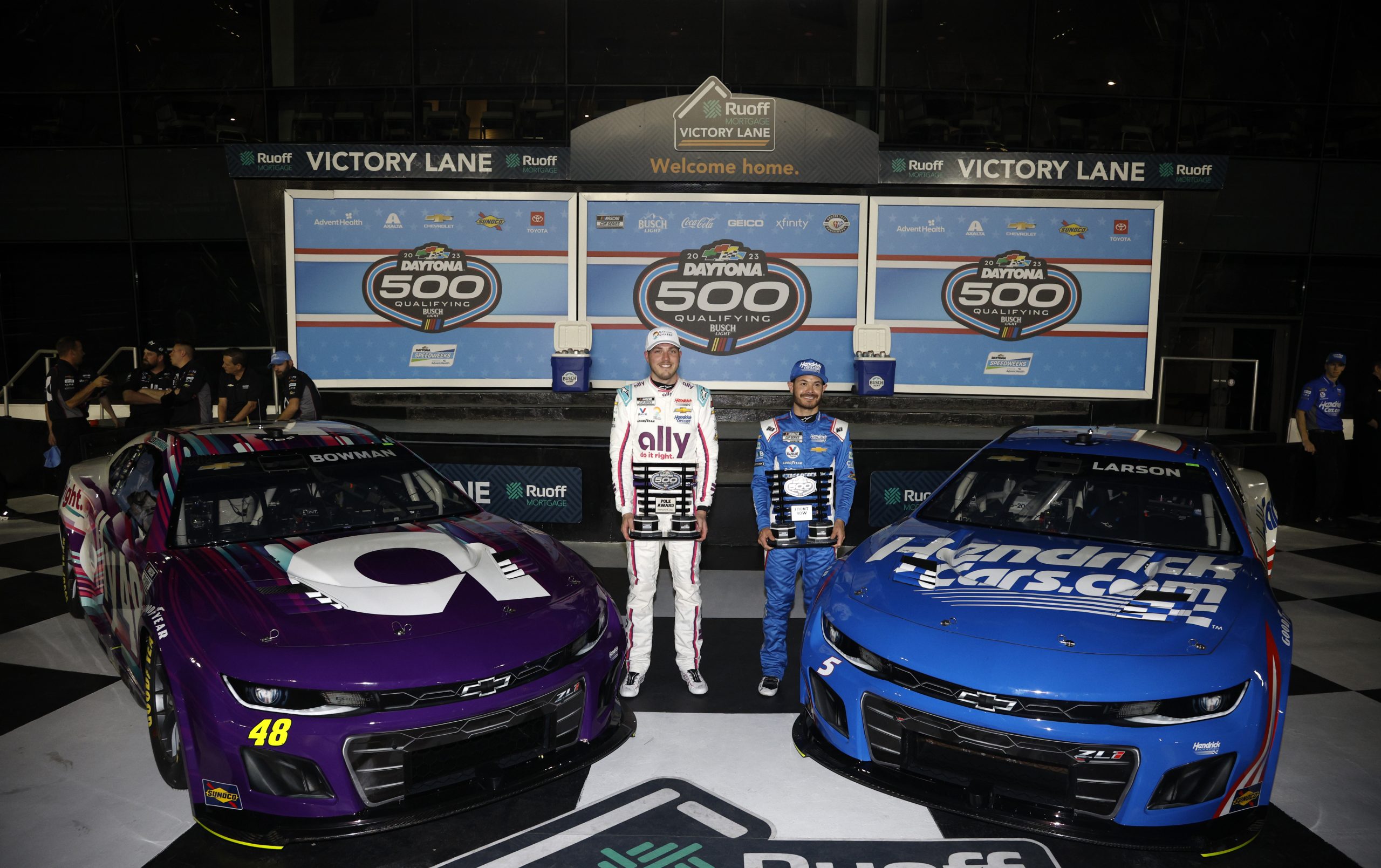DAYTONA BEACH, FLORIDA - FEBRUARY 15: Pole Award winner, Alex Bowman, driver of the #48 Ally Chevrolet, (L) and Front Row winner, Kyle Larson, driver of the #5 HendrickCars.com Chevrolet, pose for photos after the the Busch Light Pole at Daytona International Speedway on February 15, 2023 in Daytona Beach, Florida. (Photo by Sean Gardner/Getty Images)