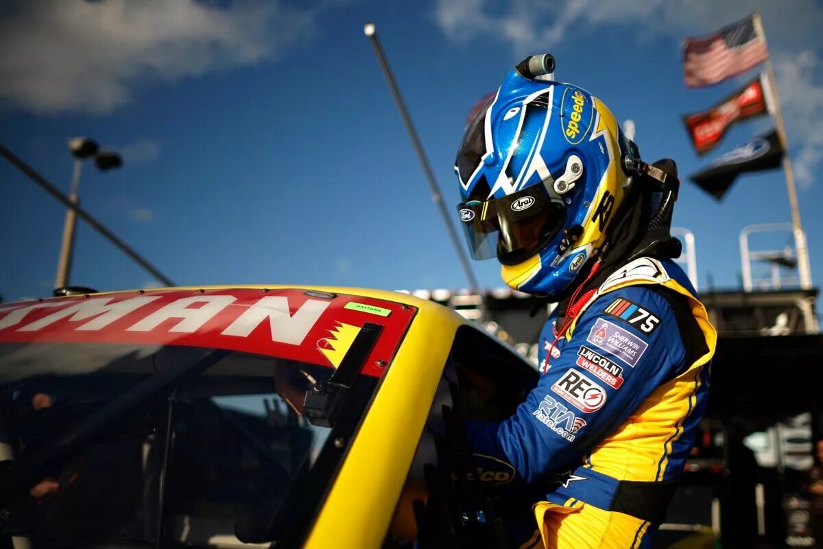 Truck Series Lineup - DAYTONA BEACH, FLORIDA - FEBRUARY 16: Zane Smith, driver of the #38 Love's/Speedco Ford, enters his truck to practice for the NASCAR Craftsman Truck Series NextEra Energy 250 at Daytona International Speedway on February 16, 2023 in Daytona Beach, Florida. (Photo by Chris Graythen/Getty Images)