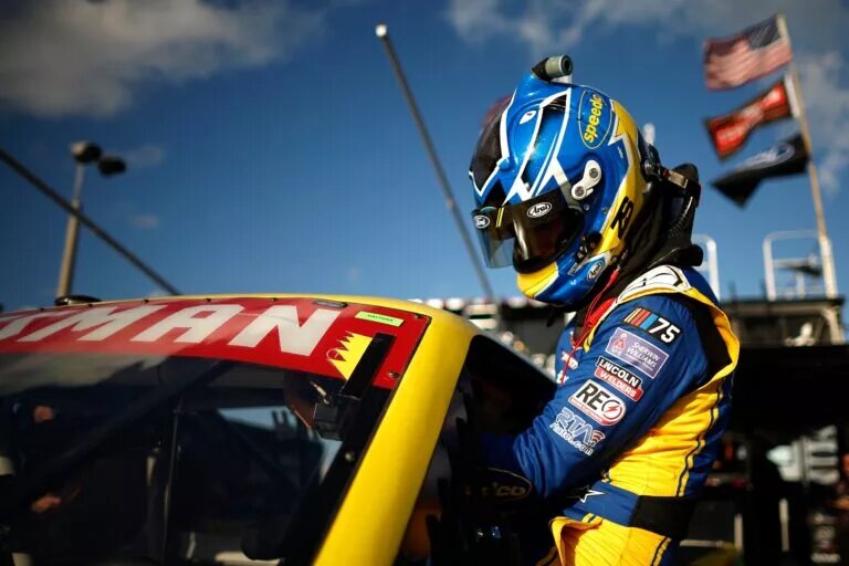 Truck Series Lineup - DAYTONA BEACH, FLORIDA - FEBRUARY 16: Zane Smith, driver of the #38 Love's/Speedco Ford, enters his truck to practice for the NASCAR Craftsman Truck Series NextEra Energy 250 at Daytona International Speedway on February 16, 2023 in Daytona Beach, Florida. (Photo by Chris Graythen/Getty Images)