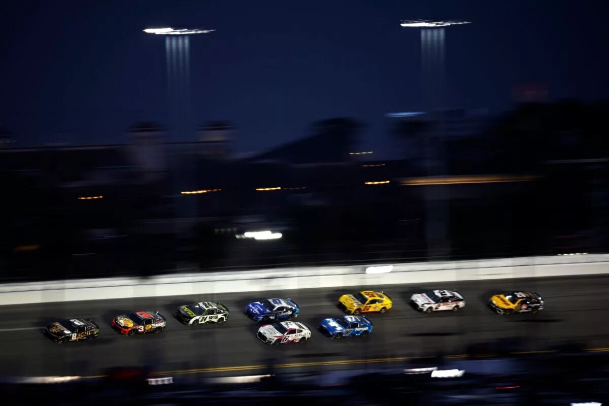 DAYTONA BEACH, FLORIDA - FEBRUARY 19: Kyle Busch, driver of the #8 3CHI Chevrolet, Austin Dillon, driver of the #3 Bass Pro Shops Club Chevrolet, Joey Logano, and William Byron, driver of the #24 RaptorTough.com Chevrolet, race during the NASCAR Cup Series 65th Annual Daytona 500 at Daytona International Speedway on February 19, 2023 in Daytona Beach, Florida. (Photo by Jared C. Tilton/Getty Images)
