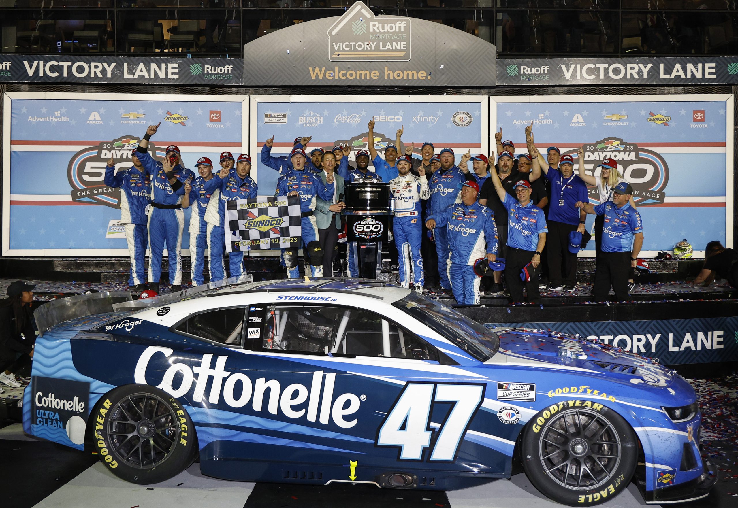 DAYTONA BEACH, FLORIDA - FEBRUARY 19: Ricky Stenhouse Jr., driver of the #47 Kroger/Cottonelle Chevrolet, and crew celebrate in victory lane after winning the NASCAR Cup Series 65th Annual Daytona 500 at Daytona International Speedway on February 19, 2023 in Daytona Beach, Florida. (Photo by Chris Graythen/Getty Images)