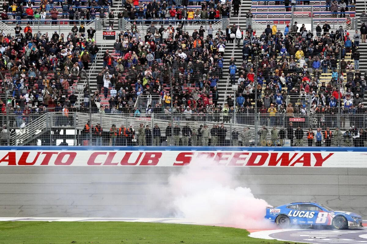 FONTANA, CALIFORNIA - FEBRUARY 26: Kyle Busch, driver of the #8 Lucas Oil Chevrolet, celebrates with a burnout after winning the NASCAR Cup Series Pala Casino 400 at Auto Club Speedway on February 26, 2023 in Fontana, California. (Photo by Meg Oliphant/Getty Images)