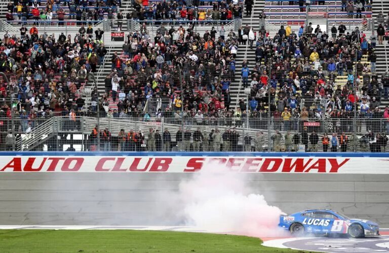 FONTANA, CALIFORNIA - FEBRUARY 26: Kyle Busch, driver of the #8 Lucas Oil Chevrolet, celebrates with a burnout after winning the NASCAR Cup Series Pala Casino 400 at Auto Club Speedway on February 26, 2023 in Fontana, California. (Photo by Meg Oliphant/Getty Images)