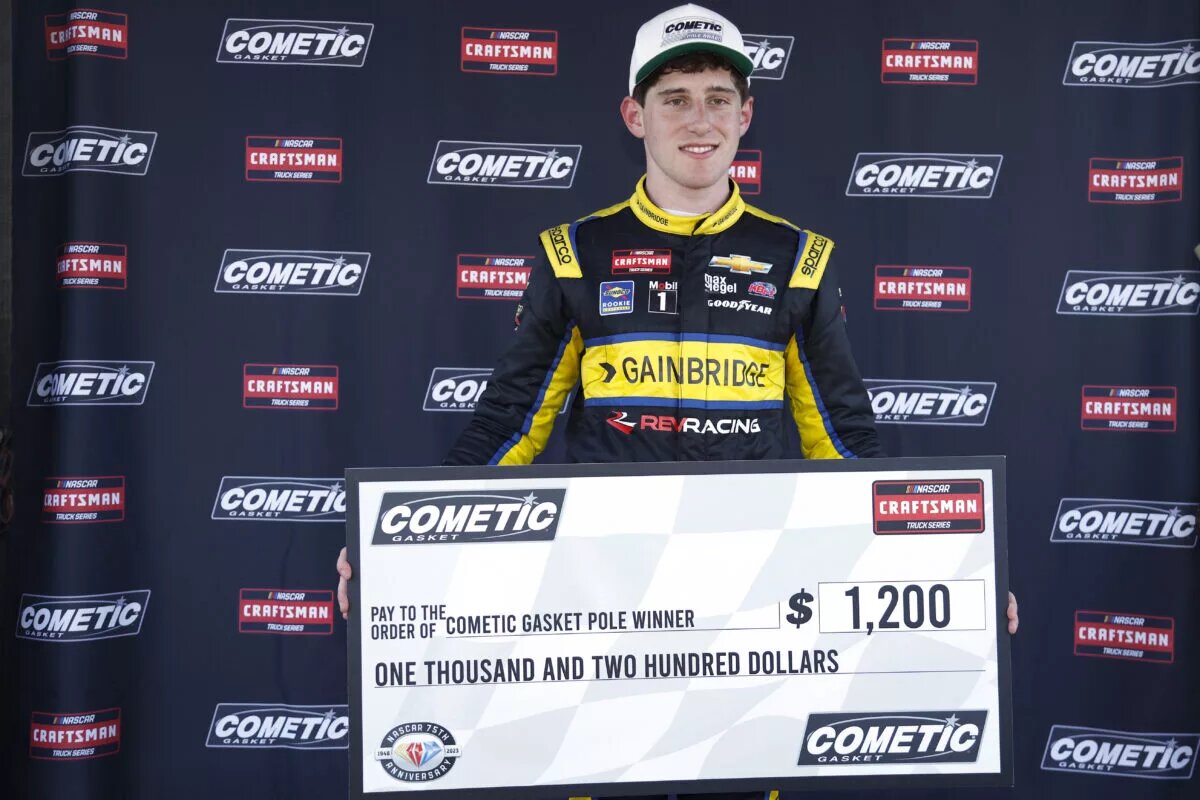 DAYTONA BEACH, FLORIDA - FEBRUARY 17: Nick Sanchez, driver of the #2 Gainbridge Chevrolet, poses with the pole award winner $1,200.00 check during qualifying for the NASCAR Craftsman Truck Series NextEra Energy 250 at Daytona International Speedway on February 17, 2023 in Daytona Beach, Florida. (Photo by Sean Gardner/Getty Images)