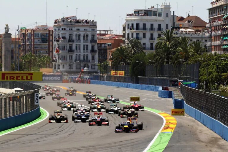 VALENCIA, SPAIN - JUNE 24: Sebastian Vettel (R) of Germany and Red Bull Racing leads the field at the start of the European Grand Prix at the Valencia Street Circuit on June 24, 2012 in Valencia, Spain. (Photo by Mark Thompson/Getty Images) *** Local Caption *** Sebastian Vettel // Getty Images / Red Bull Content Pool // SI201412168783 // Usage for editorial use only //