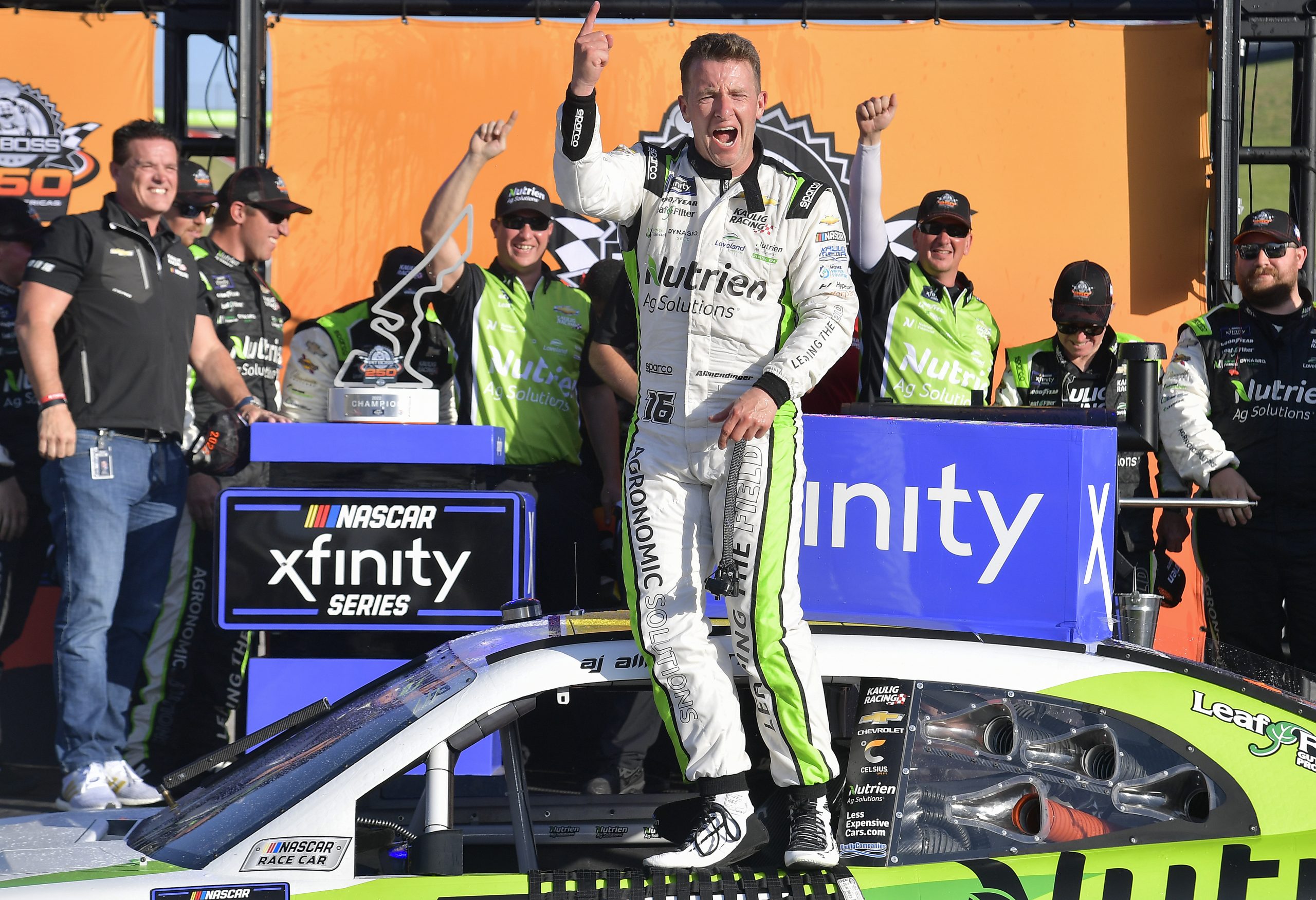 AUSTIN, TEXAS - MARCH 26: AJ Allmendinger, driver of the #16 Nutrien Ag Solutions Chevrolet, celebrates in victory lane after winning the NASCAR Xfinity Series Pit Boss 250 at Circuit of The Americas on March 26, 2022 in Austin, Texas. (Photo by Logan Riely/Getty Images)
