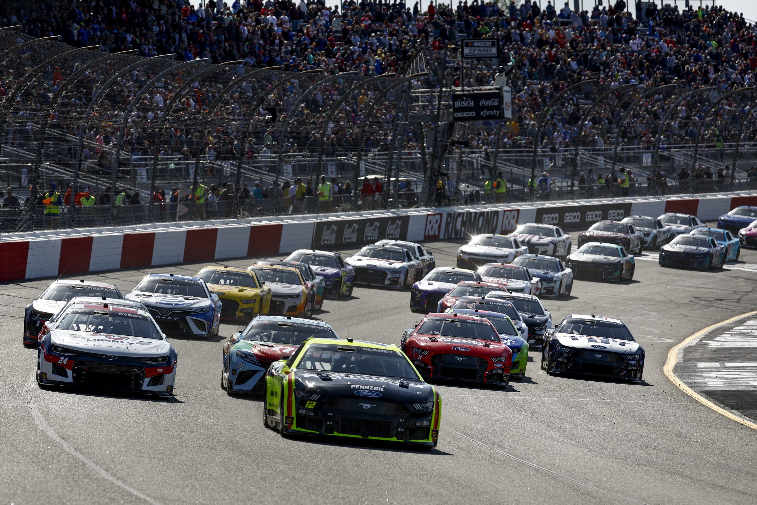 RICHMOND, VIRGINIA - APRIL 03: Ryan Blaney, driver of the #12 Menards/Richmond Water Heaters Ford, leads the field to start the NASCAR Cup Series Toyota Owners 400 at Richmond Raceway on April 03, 2022 in Richmond, Virginia. (Photo by Jared C. Tilton/Getty Images)