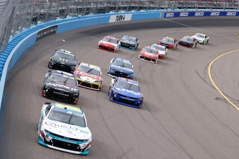 AVONDALE, ARIZONA - MARCH 11: Chandler Smith, driver of the #16 Quick Tie Products Inc. Chevrolet, Josh Berry, driver of the #8 Jarrett Logistics Systems Chevrolet, and Austin Hill, driver of the #21 United Rentals Chevrolet, race during the NASCAR Xfinity Series United Rentals 200 at Phoenix Raceway on March 11, 2023 in Avondale, Arizona. (Photo by Chris Graythen/Getty Images)