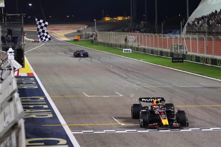 BAHRAIN, BAHRAIN - MARCH 05: Race winner Max Verstappen of the Netherlands driving the (1) Oracle Red Bull Racing RB19 takes the chequered flag during the F1 Grand Prix of Bahrain at Bahrain International Circuit on March 05, 2023 in Bahrain, Bahrain. (Photo by Peter Fox/Getty Images) // Getty Images / Red Bull Content Pool // SI202303050273 // Usage for editorial use only //