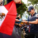 MELBOURNE, AUSTRALIA - MARCH 30: Sergio Perez of Mexico and Oracle Red Bull Racing greets fans on the Melbourne Walk during previews ahead of the F1 Grand Prix of Australia at Albert Park Grand Prix Circuit on March 30, 2023 in Melbourne, Australia. (Photo by Quinn Rooney/Getty Images) // Getty Images / Red Bull Content Pool // SI202303300098 // Usage for editorial use only //