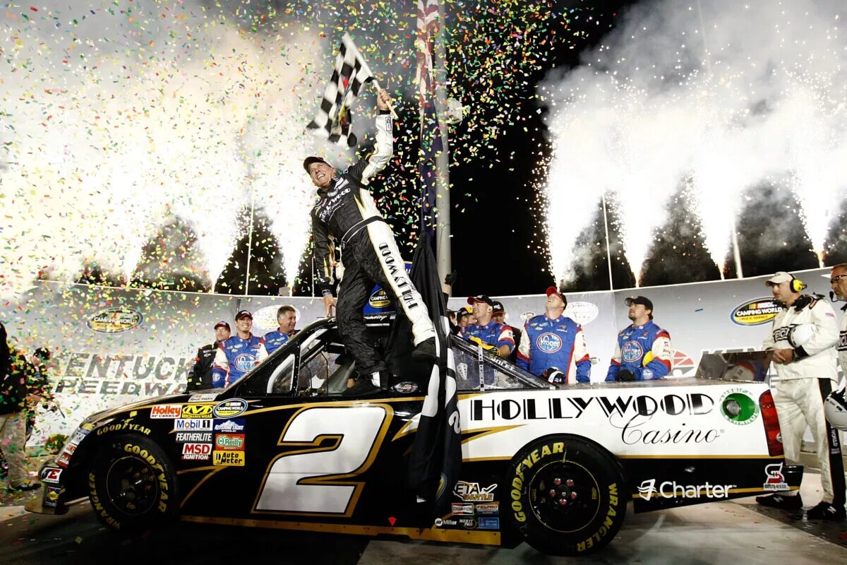 SPARTA, KY - OCTOBER 01: Ron Hornaday Jr. driver of the #2 Hollywood Casino Chevrolet celebrates winning his 50th race after the NASCAR Camping World Truck Series Kentucky 225 on October 1, 2011 at Kentucky Speedway in Sparta, Kentucky. (Photo by Jonathan Ferrey/Getty Images for NASCAR)