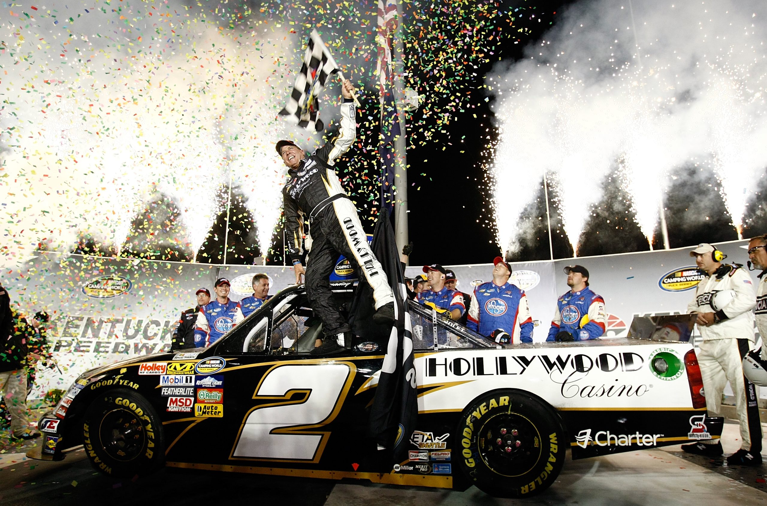 SPARTA, KY - OCTOBER 01: Ron Hornaday Jr. driver of the #2 Hollywood Casino Chevrolet celebrates winning his 50th race after the NASCAR Camping World Truck Series Kentucky 225 on October 1, 2011 at Kentucky Speedway in Sparta, Kentucky. (Photo by Jonathan Ferrey/Getty Images for NASCAR)