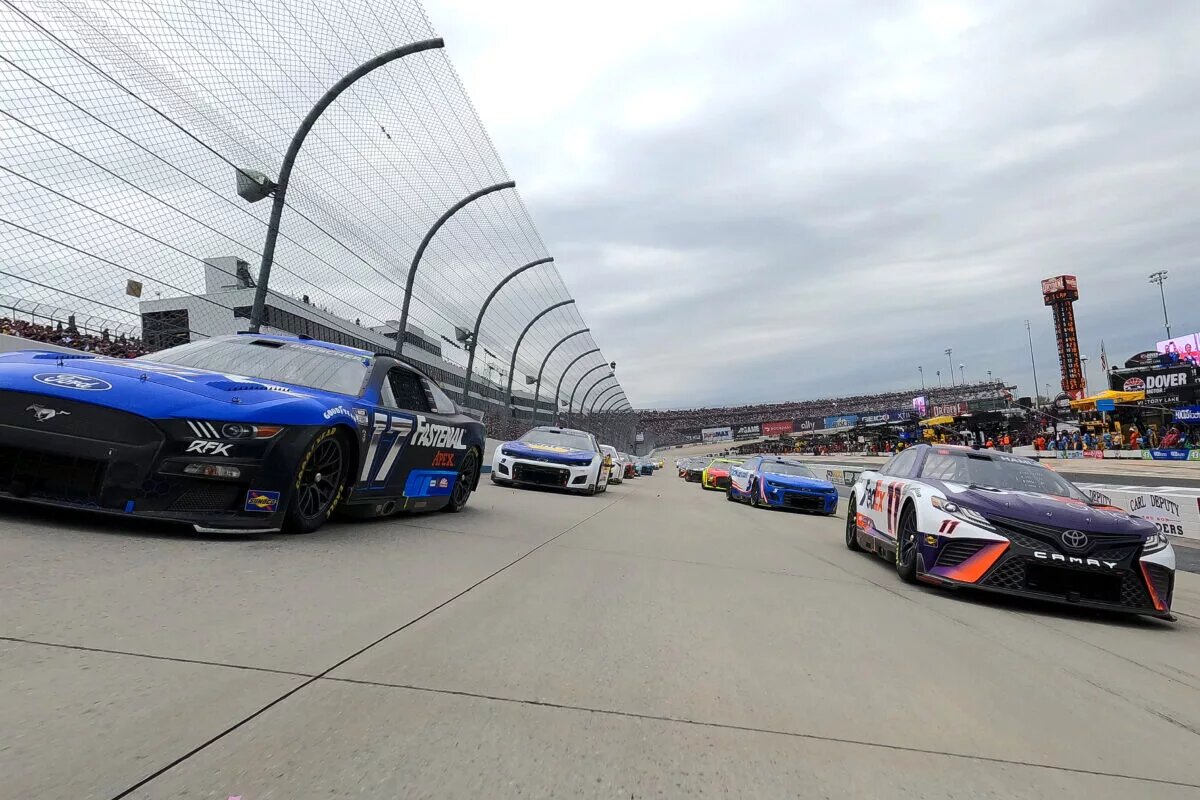 Credit: DOVER, DELAWARE - MAY 01: Chris Buescher, driver of the #17 Fastenal Ford, and Denny Hamlin, driver of the #11 FedEx Office Toyota, lead the field on a pace lap prior to the NASCAR Cup Series DuraMAX Drydene 400 presented by RelaDyne at Dover Motor Speedway on May 01, 2022 in Dover, Delaware. (Photo by Sean Gardner/Getty Images)