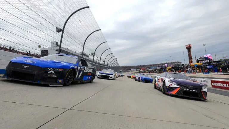 Credit: DOVER, DELAWARE - MAY 01: Chris Buescher, driver of the #17 Fastenal Ford, and Denny Hamlin, driver of the #11 FedEx Office Toyota, lead the field on a pace lap prior to the NASCAR Cup Series DuraMAX Drydene 400 presented by RelaDyne at Dover Motor Speedway on May 01, 2022 in Dover, Delaware. (Photo by Sean Gardner/Getty Images)