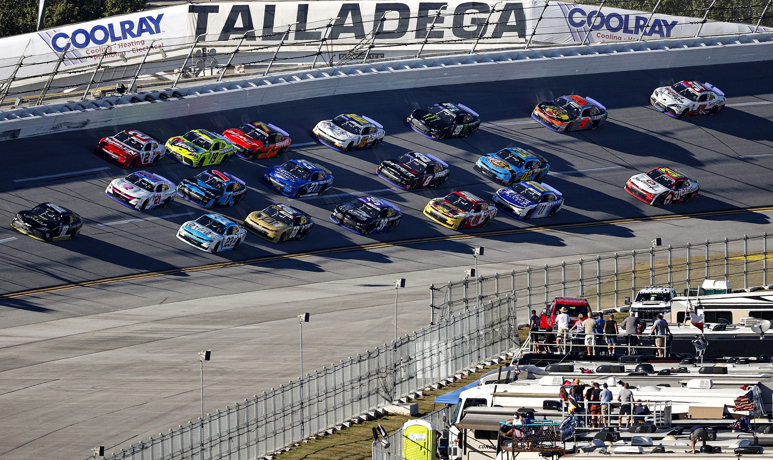 Credit: TALLADEGA, ALABAMA - OCTOBER 01: Trevor Bayne, driver of the #18 Dollar Concrete Toyota, leads the field during the NASCAR Xfinity Series Sparks 300 at Talladega Superspeedway on October 01, 2022 in Talladega, Alabama. (Photo by Chris Graythen/Getty Images)