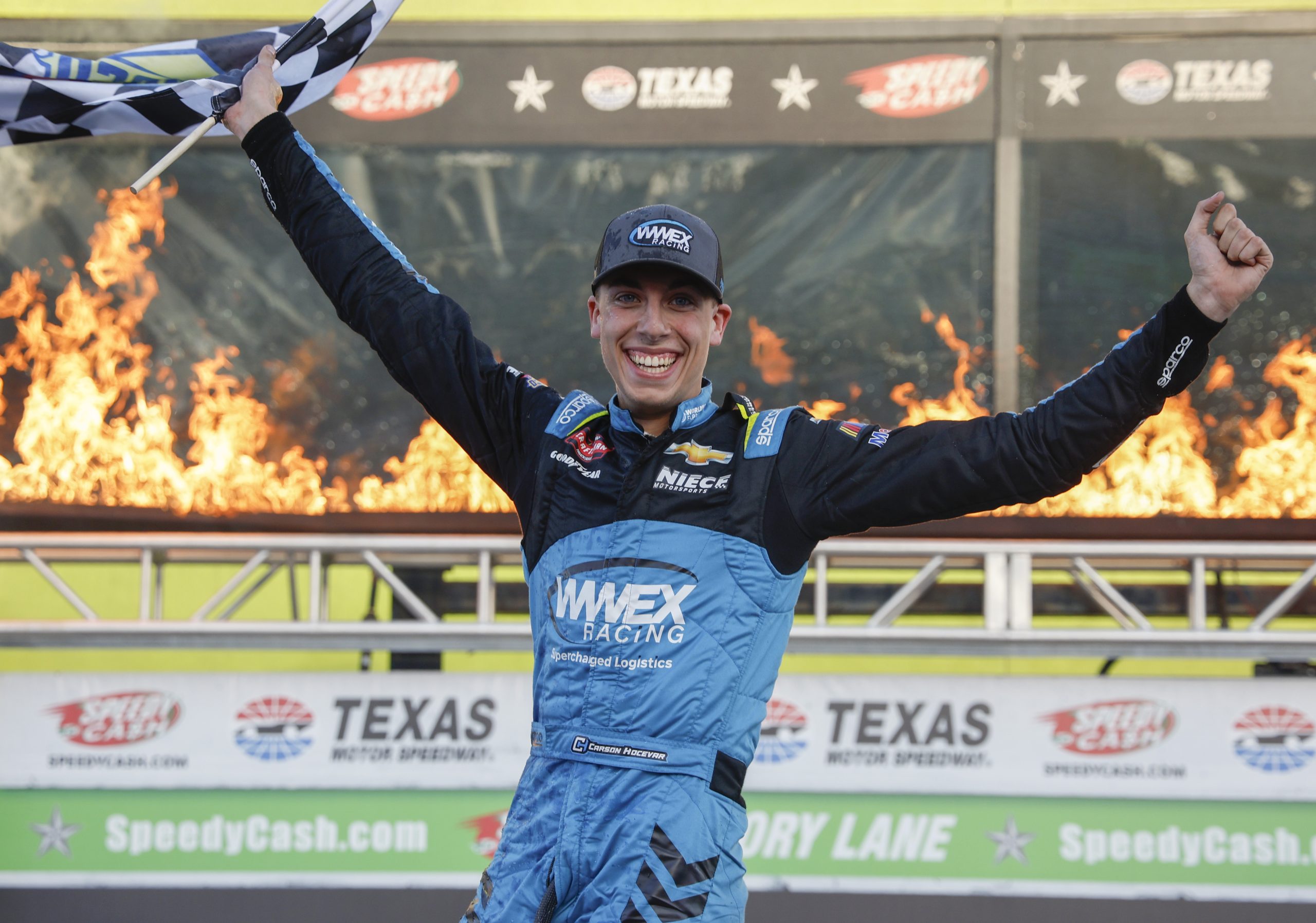 Credit: FORT WORTH, TEXAS - APRIL 01: Carson Hocevar, driver of the #42 Worldwide Express Chevrolet, celebrates in victory lane after winning the NASCAR Craftsman Truck Series SpeedyCash.com 250 at Texas Motor Speedway on April 01, 2023 in Fort Worth, Texas. (Photo by Chris Graythen/Getty Images)