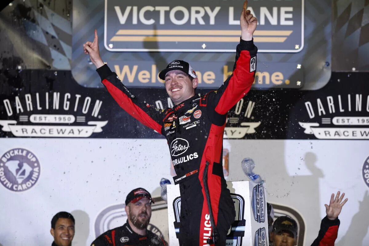 DARLINGTON, SOUTH CAROLINA - MAY 12: Christian Eckes, driver of the #19 Gates Hydraulics Chevrolet, celebrates in victory lane after winning the NASCAR Craftsman Truck Series Buckle Up South Carolina 200 at Darlington Raceway on May 12, 2023 in Darlington, South Carolina. (Photo by Jared C. Tilton/Getty Images)