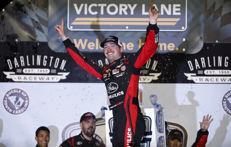 DARLINGTON, SOUTH CAROLINA - MAY 12: Christian Eckes, driver of the #19 Gates Hydraulics Chevrolet, celebrates in victory lane after winning the NASCAR Craftsman Truck Series Buckle Up South Carolina 200 at Darlington Raceway on May 12, 2023 in Darlington, South Carolina. (Photo by Jared C. Tilton/Getty Images)