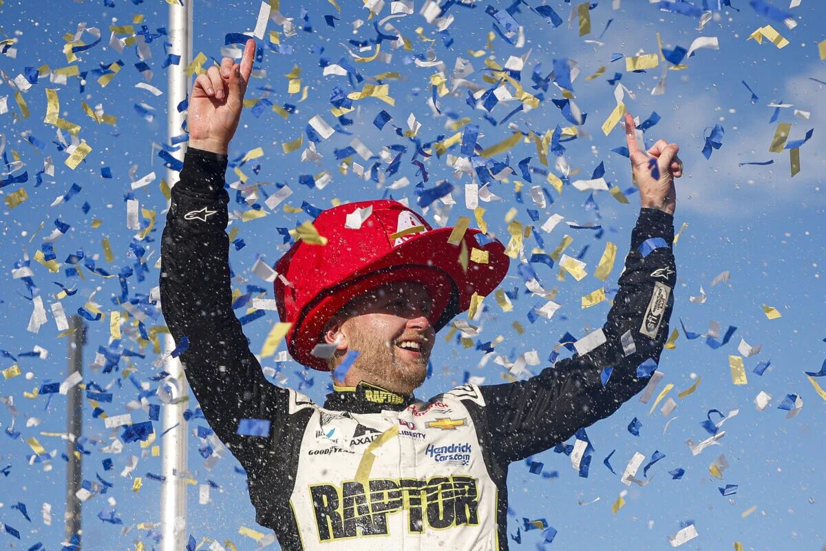 DARLINGTON, SOUTH CAROLINA - MAY 14: William Byron, driver of the #24 Axalta Throwback Chevrolet, celebrates in victory lane after winning the NASCAR Cup Series Goodyear 400 at Darlington Raceway on May 14, 2023 in Darlington, South Carolina. (Photo by Jared C. Tilton/Getty Images)