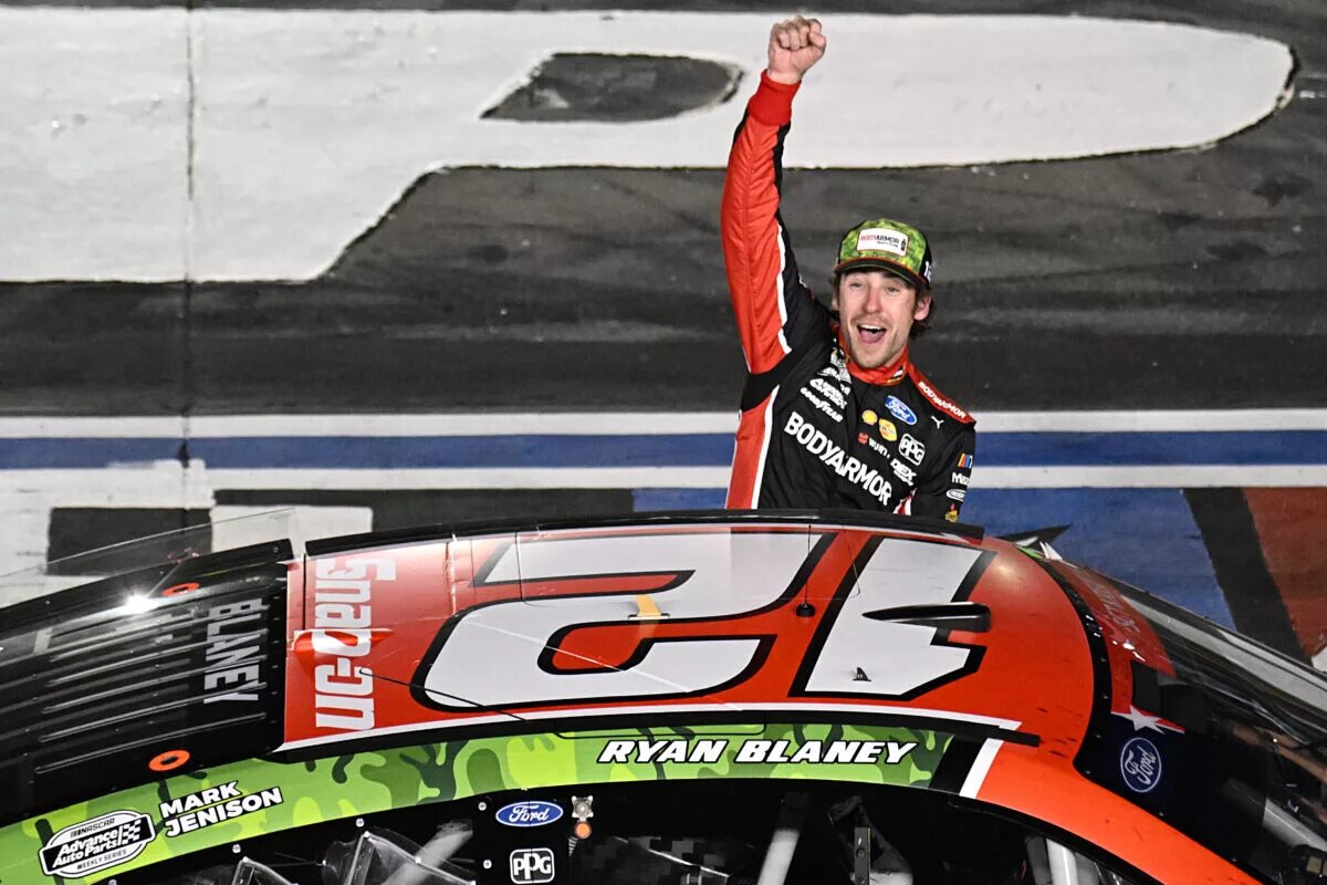 CONCORD, NORTH CAROLINA - MAY 29: Ryan Blaney, driver of the #12 BodyArmor Cherry Lime Ford, celebrates after winning the NASCAR Cup Series Coca-Cola 600 at Charlotte Motor Speedway on May 29, 2023 in Concord, North Carolina. (Photo by Logan Riely/Getty Images)