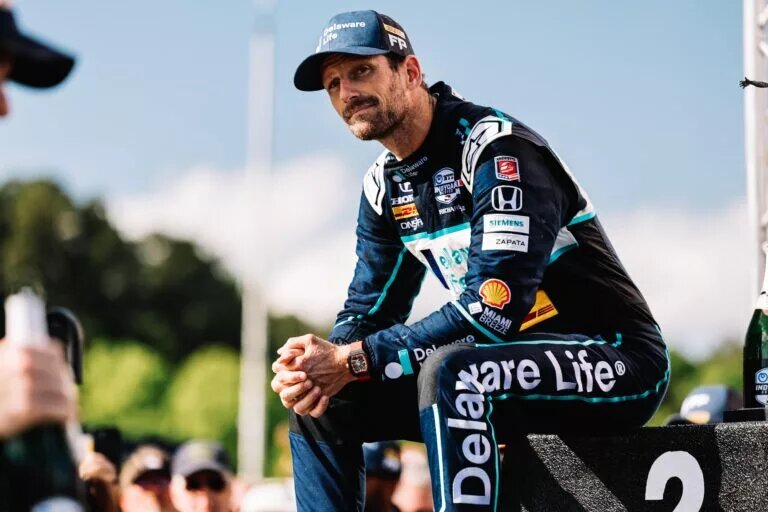 Romain Grosjean reflects at the podium of the 2023 Children's of Alabama Grand Prix. (Joe Skibinski/Penske Entertainment)