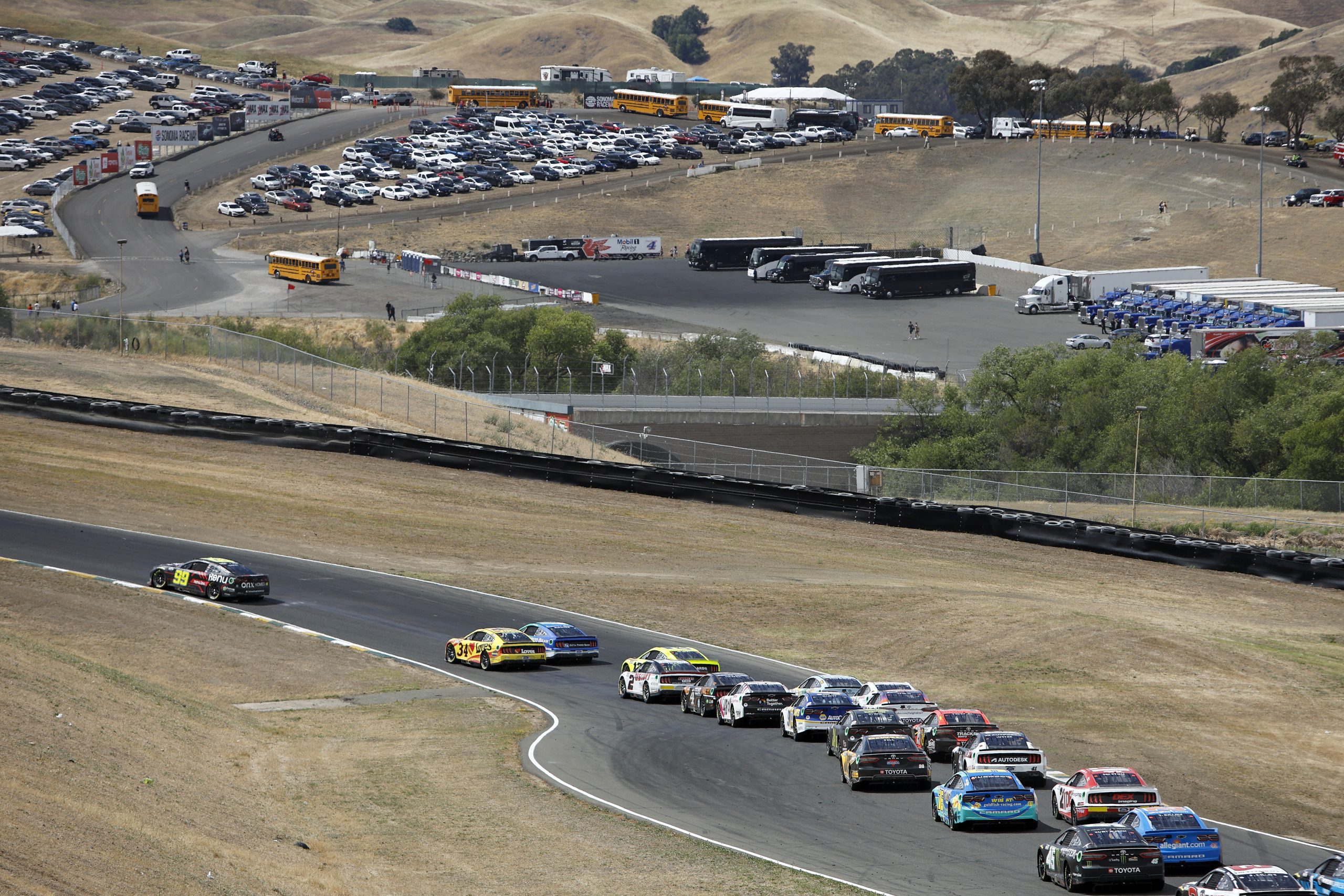SONOMA, CALIFORNIA - JUNE 12: Daniel Suarez, driver of the #99 Onx Homes/Renu Chevrolet, leads the field during the NASCAR Cup Series Toyota/Save Mart 350 at Sonoma Raceway on June 12, 2022 in Sonoma, California. (Photo by Sean Gardner/Getty Images)