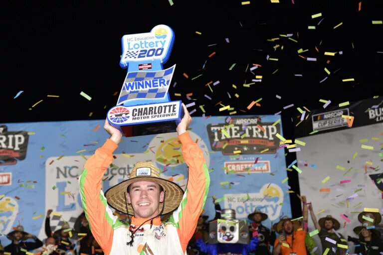 CONCORD, NORTH CAROLINA - MAY 26: Ben Rhodes, driver of the #99 Campers Inn RV Ford, celebrates in Victory Lane after winning the NASCAR Craftsman Truck Series North Carolina Education Lottery 200 at Charlotte Motor Speedway on May 26, 2023 in Concord, North Carolina. (Photo by Logan Riely/Getty Images)