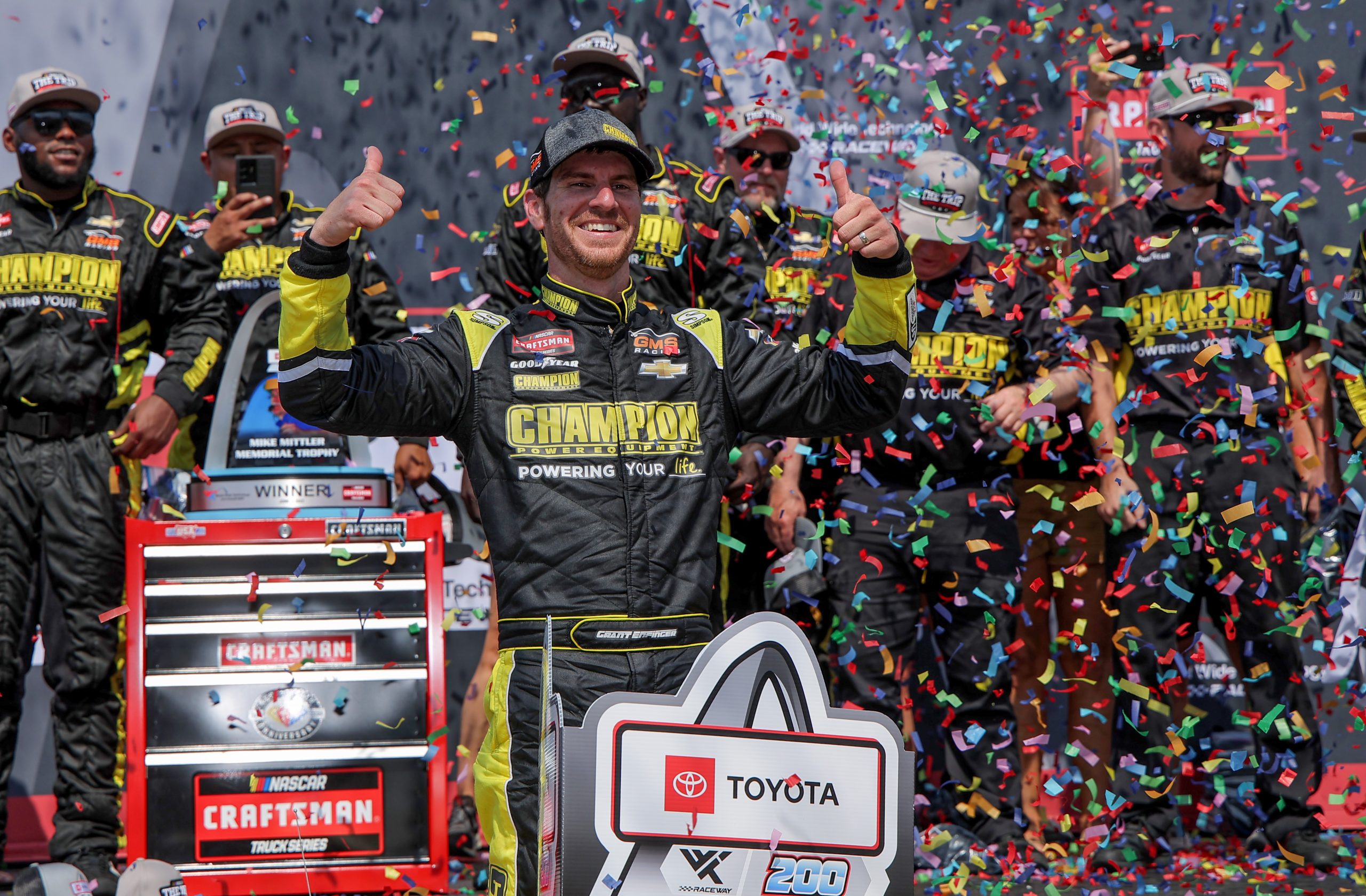 MADISON, ILLINOIS - JUNE 03: Grant Enfinger, driver of the #23 Champion Power Equipment Chevrolet, celebrates in victory lane after winning the NASCAR Craftsman Truck Series Toyota 200 at WWT Raceway on June 03, 2023 in Madison, Illinois. (Photo by Jonathan Bachman/Getty Images)