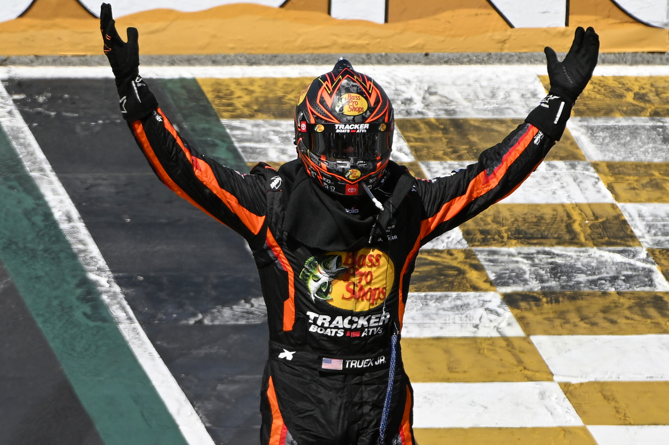 SONOMA, CALIFORNIA - JUNE 11: Martin Truex Jr., driver of the #19 Bass Pro Shops Toyota, celebrates after winning the NASCAR Cup Series Toyota / Save Mart 350 at Sonoma Raceway on June 11, 2023 in Sonoma, California. (Photo by Logan Riely/Getty Images)