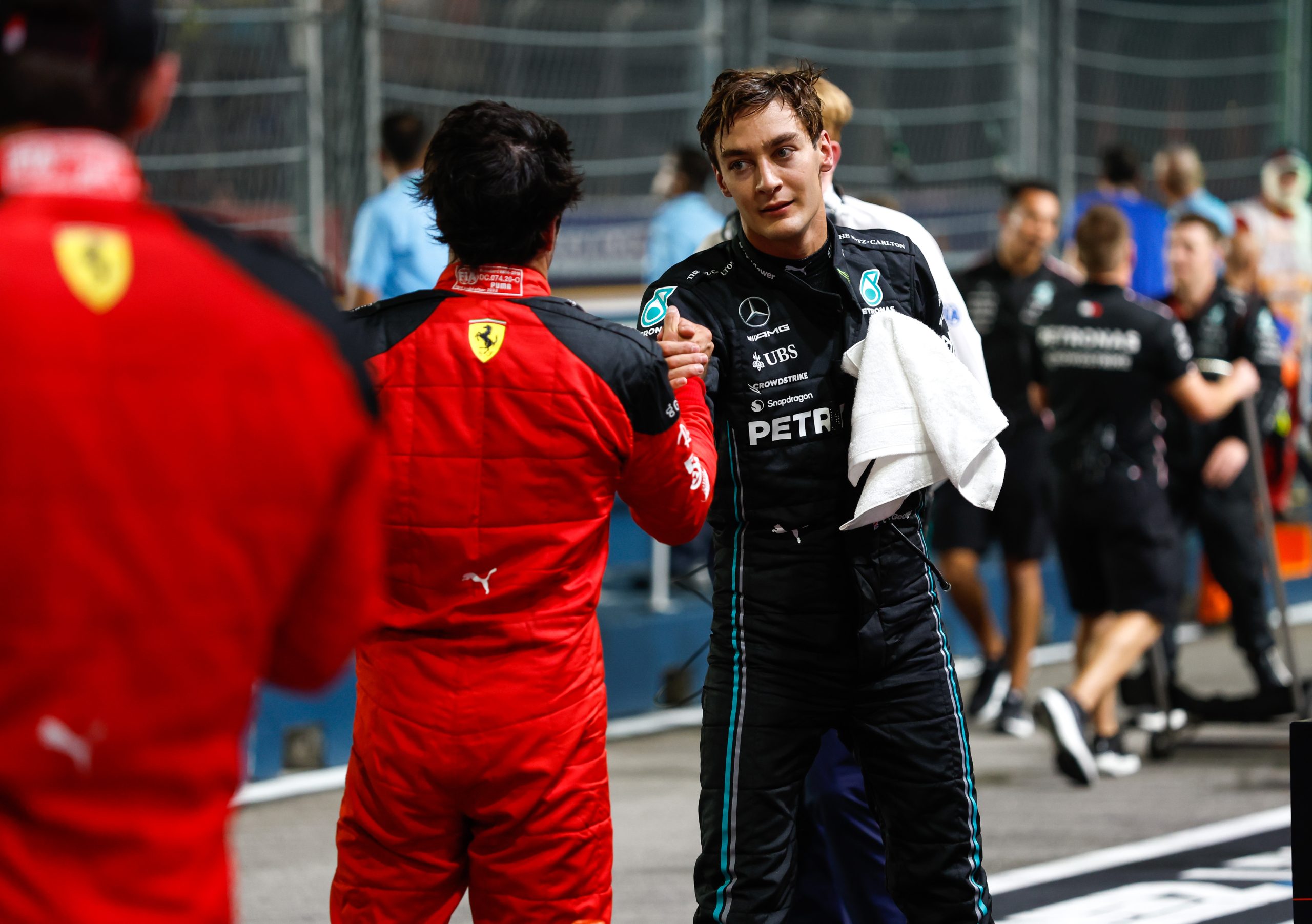 George Russell, Mercedes, and Carlos Sainz, Ferrari, at the Singapore Grand Prix, 2023