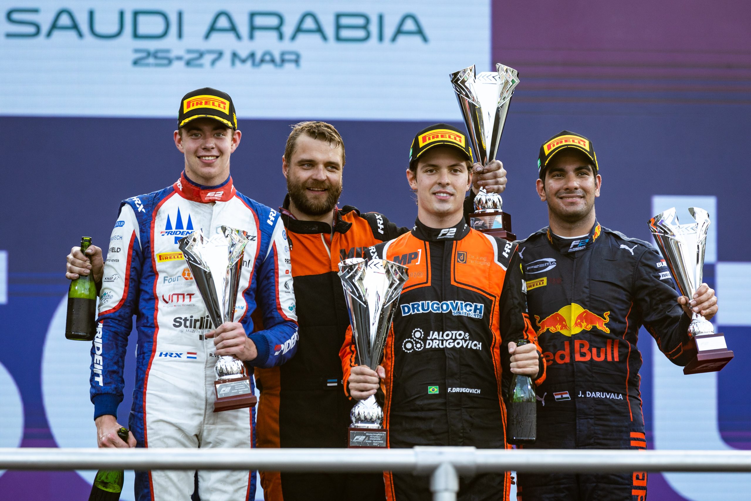 Felipe Drugovich on the top step of the podium in Jeddah.