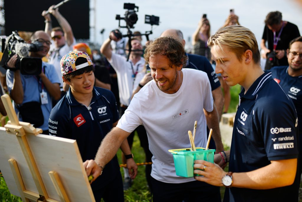Sebastian Vettel painting with Yuki Tsunoda & Liam Lawson at the Japanese Grand Prix, 2023