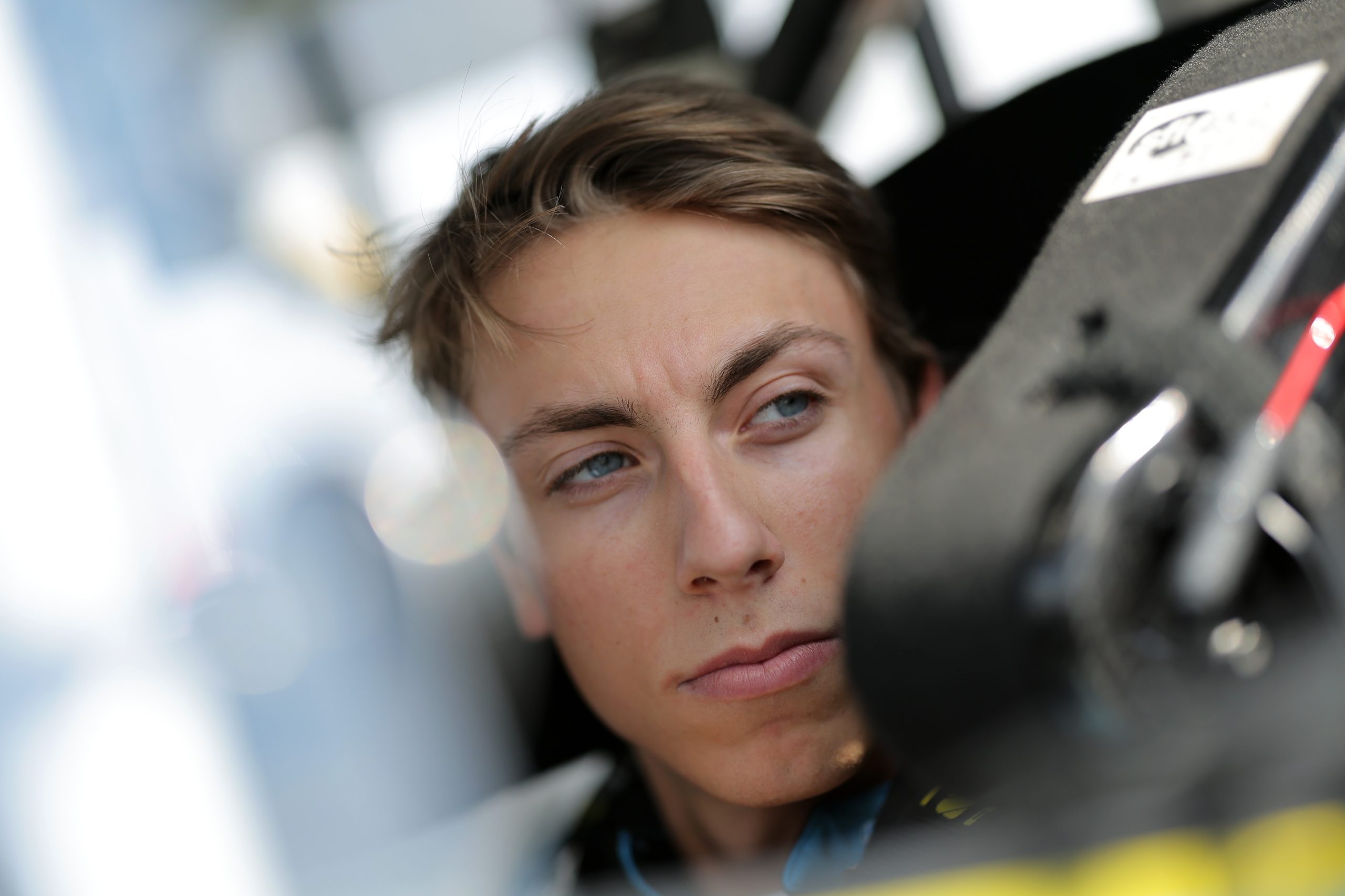 Carson Hocevar, driver of the #42 Worldwide Express Chevrolet, sits in his truck during practice for the NASCAR Craftsman Truck Series Clean Harbors 175 at The Milwaukee Mile on August 26, 2023 in West Allis, Wisconsin.