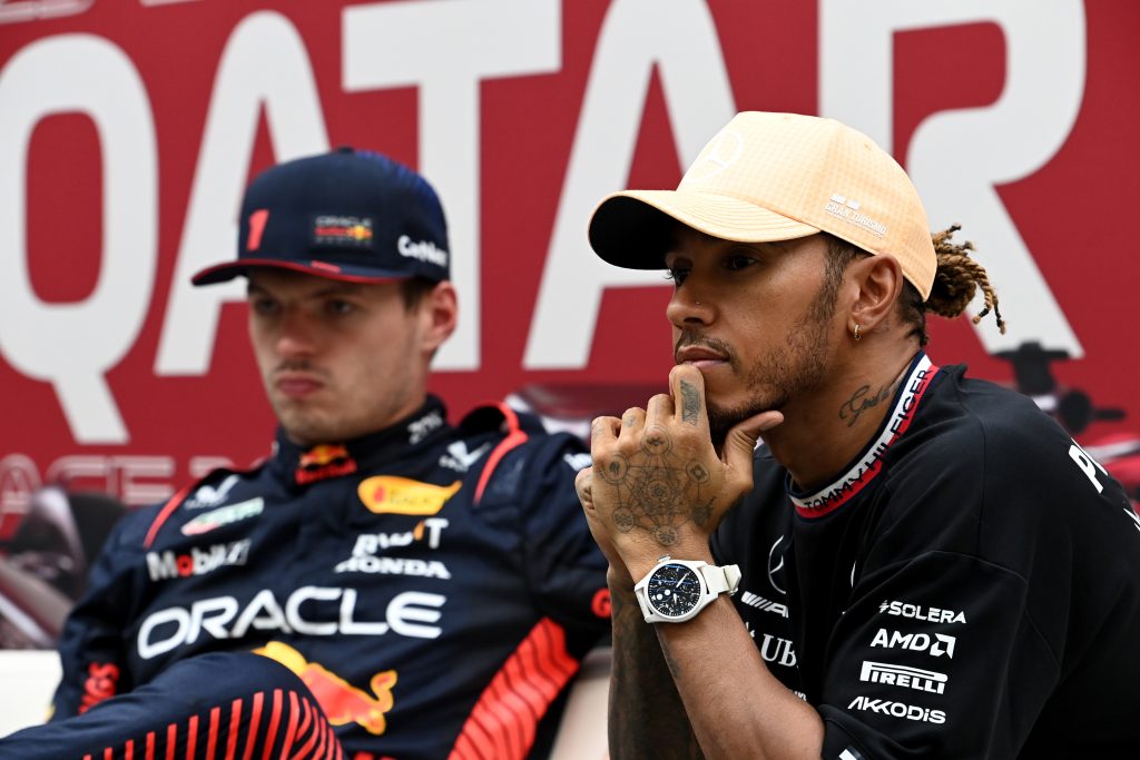 Lewis Hamilton of Mercedes sitting next to Max Verstappen of Red Bull Racing at the Qatar Grand Prix, 2023