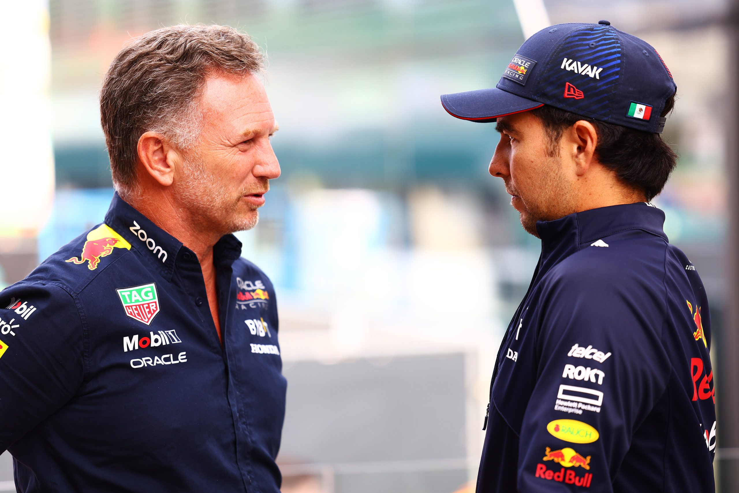 Red Bull Racing team boss Christian Horner talking to Sergio Perez at the Dutch Grand Prix, 2023