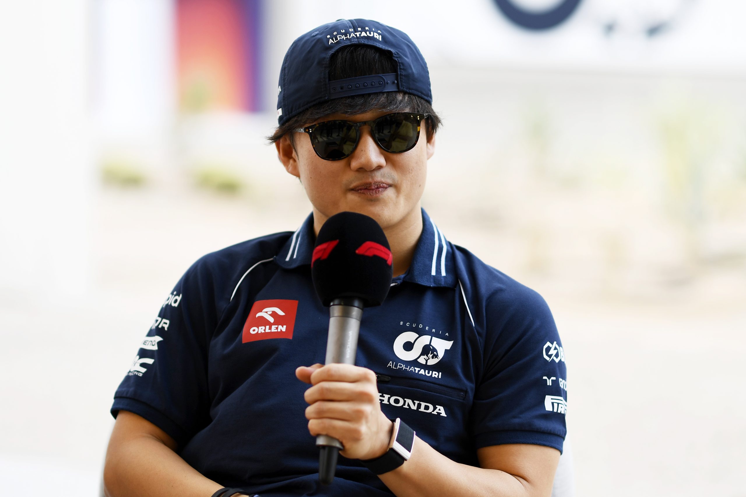 Yuki Tsunoda of Japan and Scuderia AlphaTauri talks to the media in the Paddock prior to practice ahead of the F1 Grand Prix of Qatar at Lusail International Circuit. Red Bull Academy product.