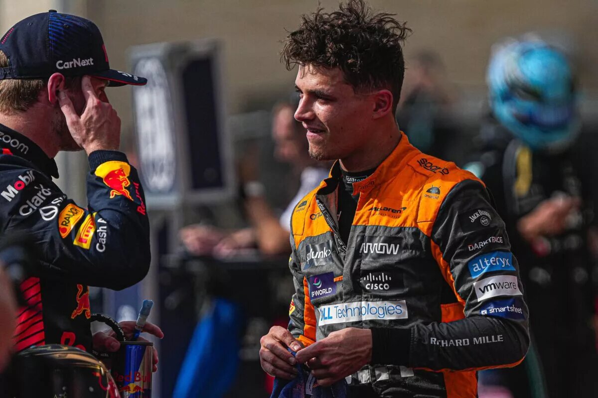 McLaren driver Lando Norris, right, speaks to Oracle Red Bull Racing driver Max Verstappen