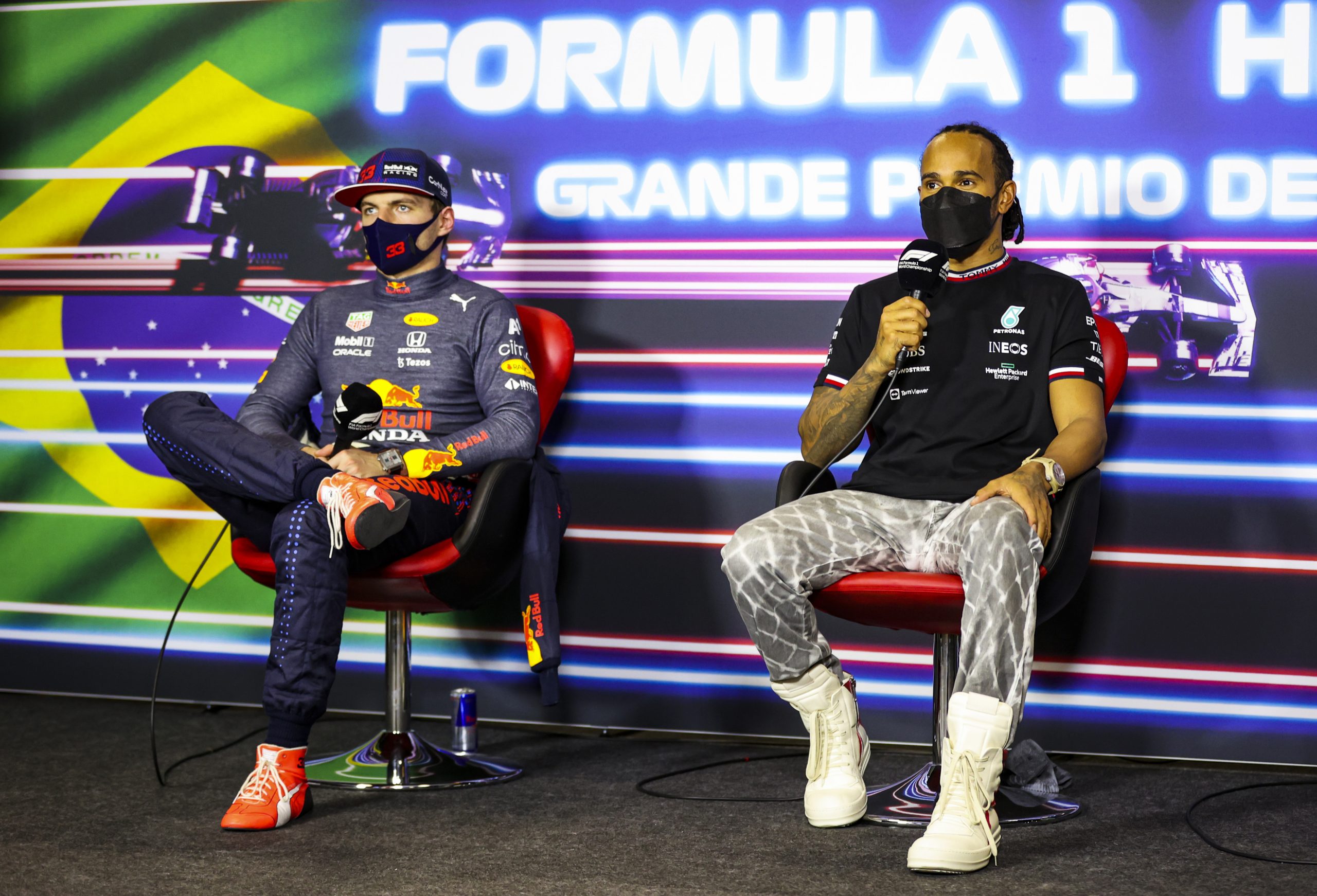 Lewis Hamilton of Mercedes second placed Max Verstappen Red Bull Racing talk in the press conference after the F1 Grand Prix of Brazil, 2021