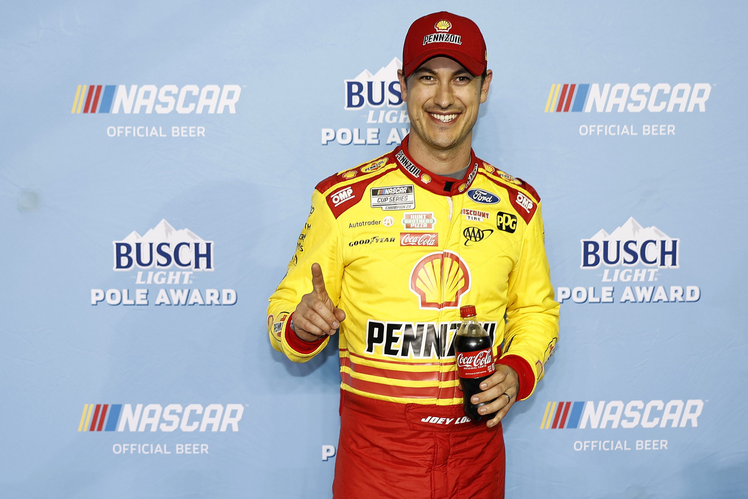 Joey Logano, driver of the #22 Shell Pennzoil Ford, winner of the Daytona 500 pole award poses for a photo during qualifying for the NASCAR Cup Series Daytona 500 at Daytona International Speedway on February 14, 2024 in Daytona Beach, Florida. (Photo by James Gilbert/Getty Images) Joey Logano gloves
