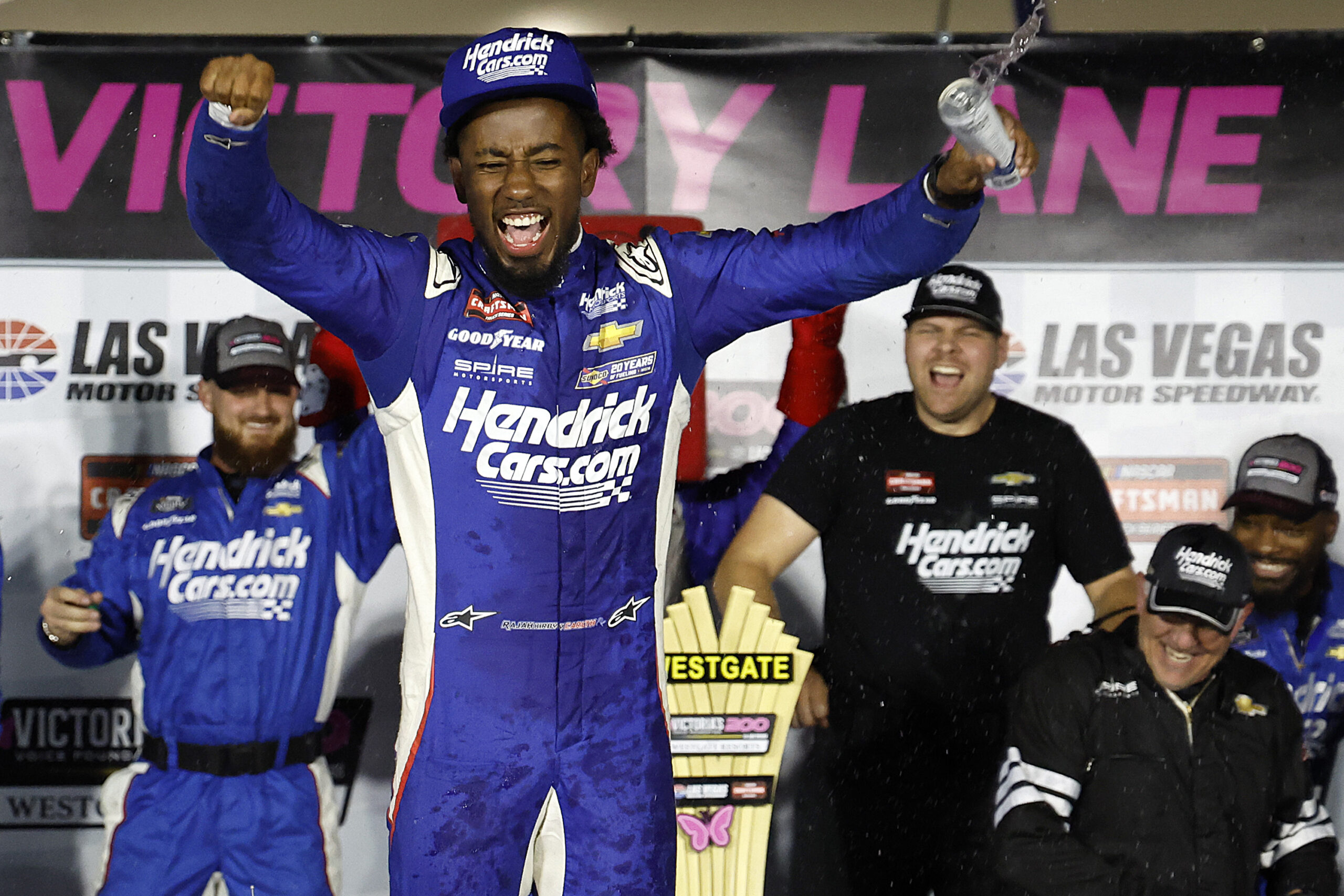 Rajah Caruth, driver of the #71 HendrickCars.com Chevrolet, celebrates in victory lane after winning the NASCAR Craftsman Truck Series Victoria's Voice Foundation 200 at Las Vegas Motor Speedway on March 01, 2024 in Las Vegas, Nevada. (Photo by Chris Graythen/Getty Images)