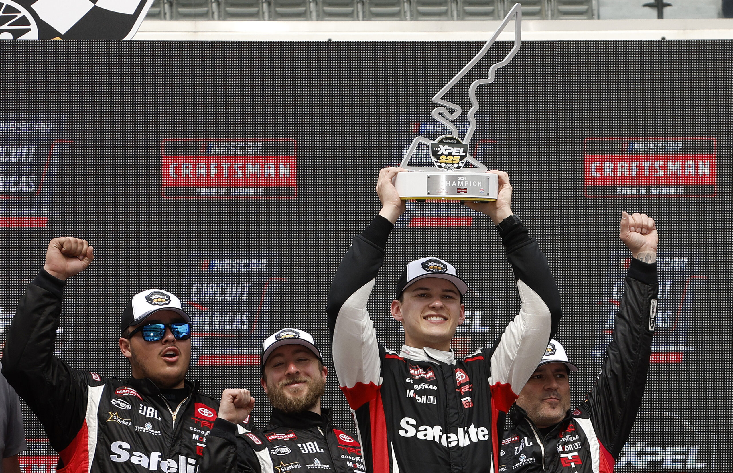 AUSTIN, TEXAS - MARCH 23: Corey Heim, driver of the #11 Safelite Toyota, celebrates in victory lane after winning the NASCAR Craftsman Truck Series XPEL 225 at Circuit of The Americas on March 23, 2024 in Austin, Texas. (Photo by Sean Gardner/Getty Images)